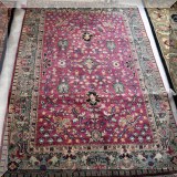 R32. Red and green Oriental rug.